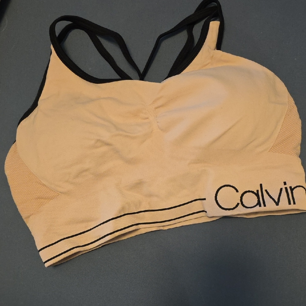 Calvin Klein Nude Seamless Light Support Sports Bra with Black Trim
